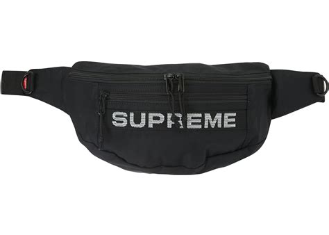 wearing supreme waist bag.